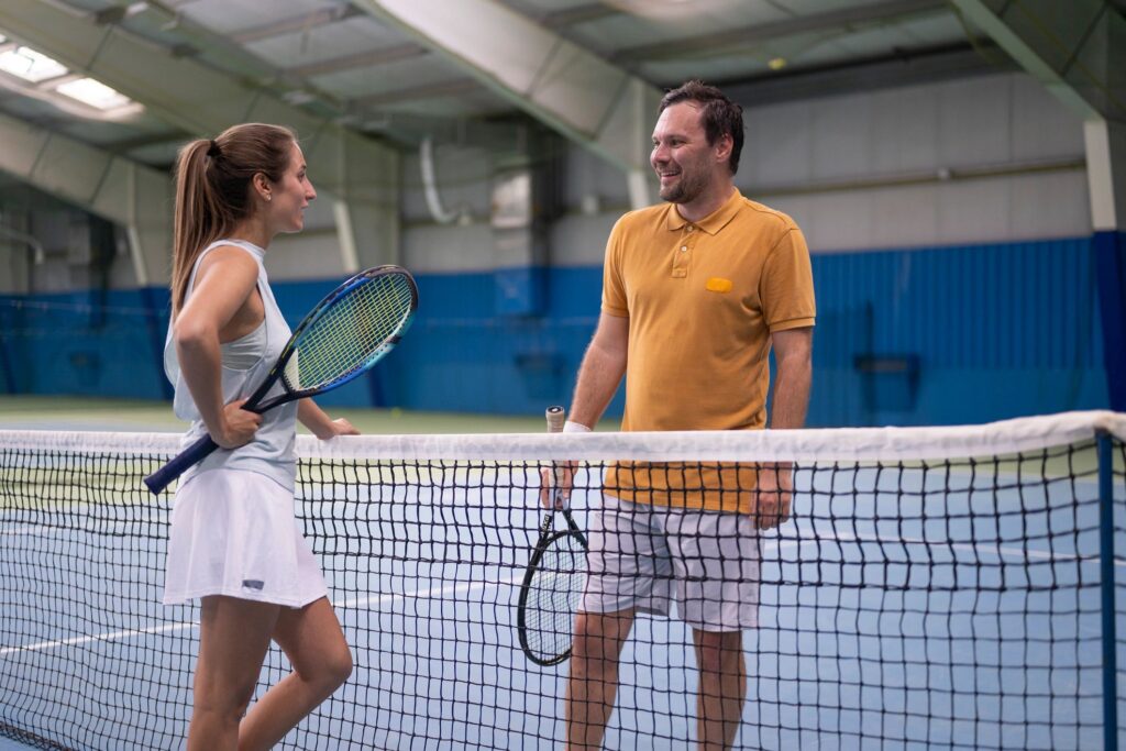 Tennis Coaching Session with Caucasian Player and Coach